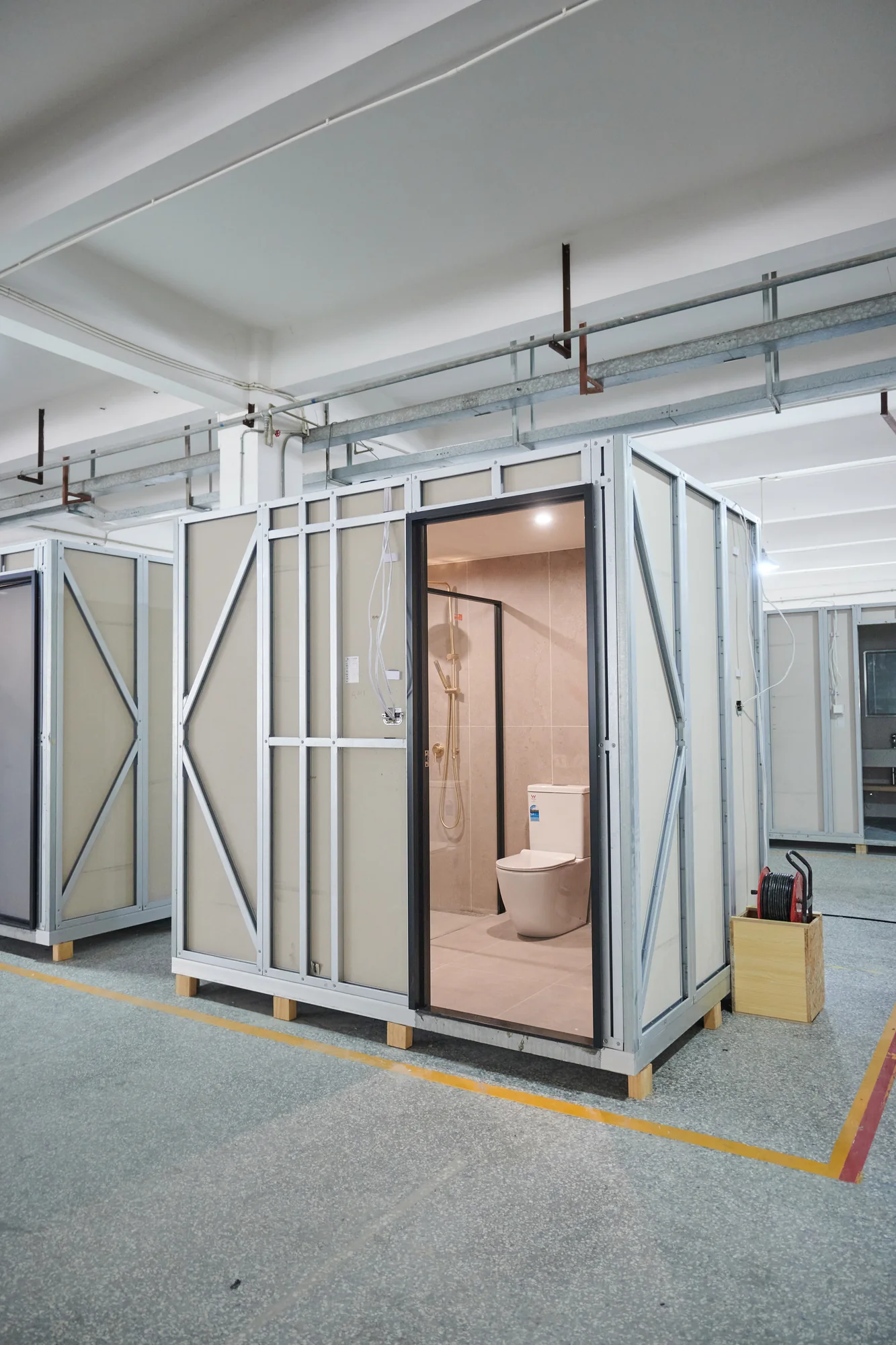 Complete bathroom pod exterior on a production floor