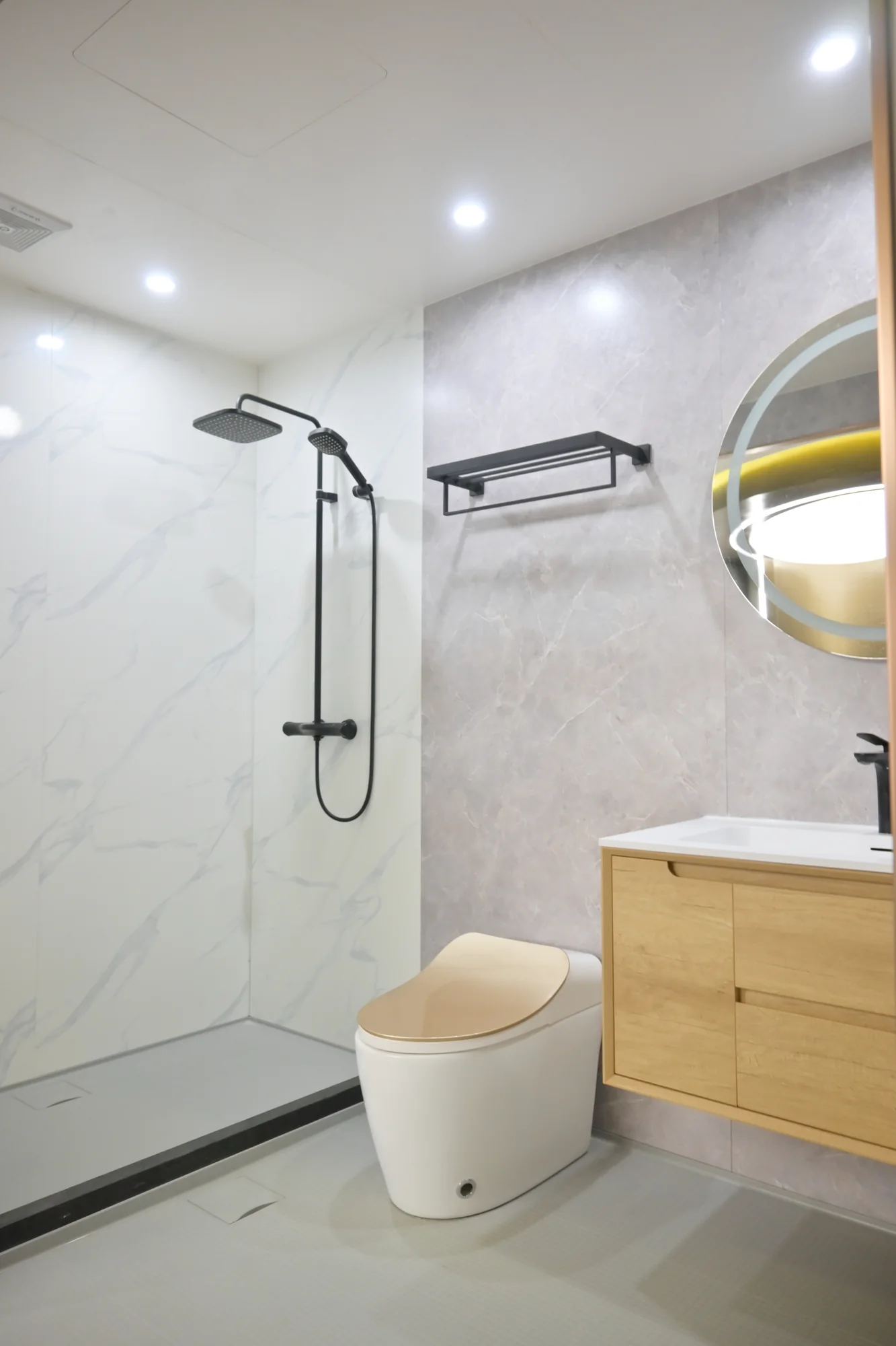 Apartment bathroom sample interior with shower, toilet and vanity