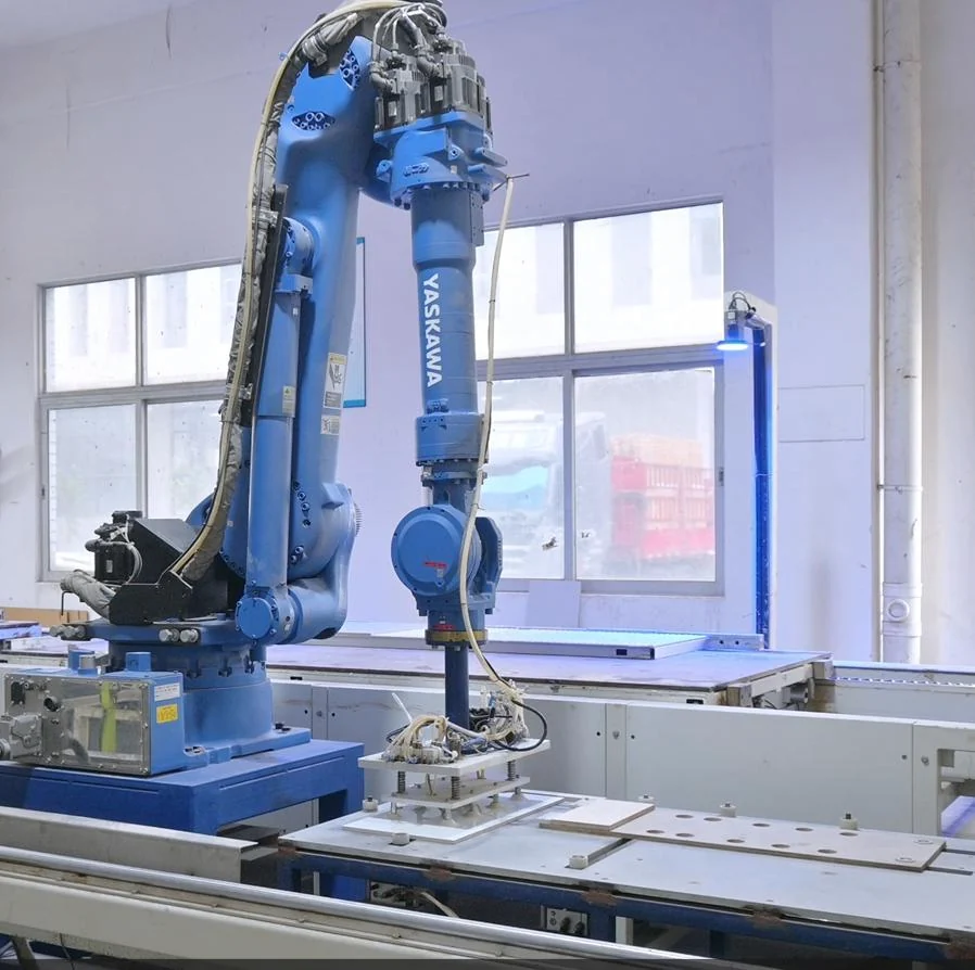 Industrial robot working over panel components in the SALLY production environment