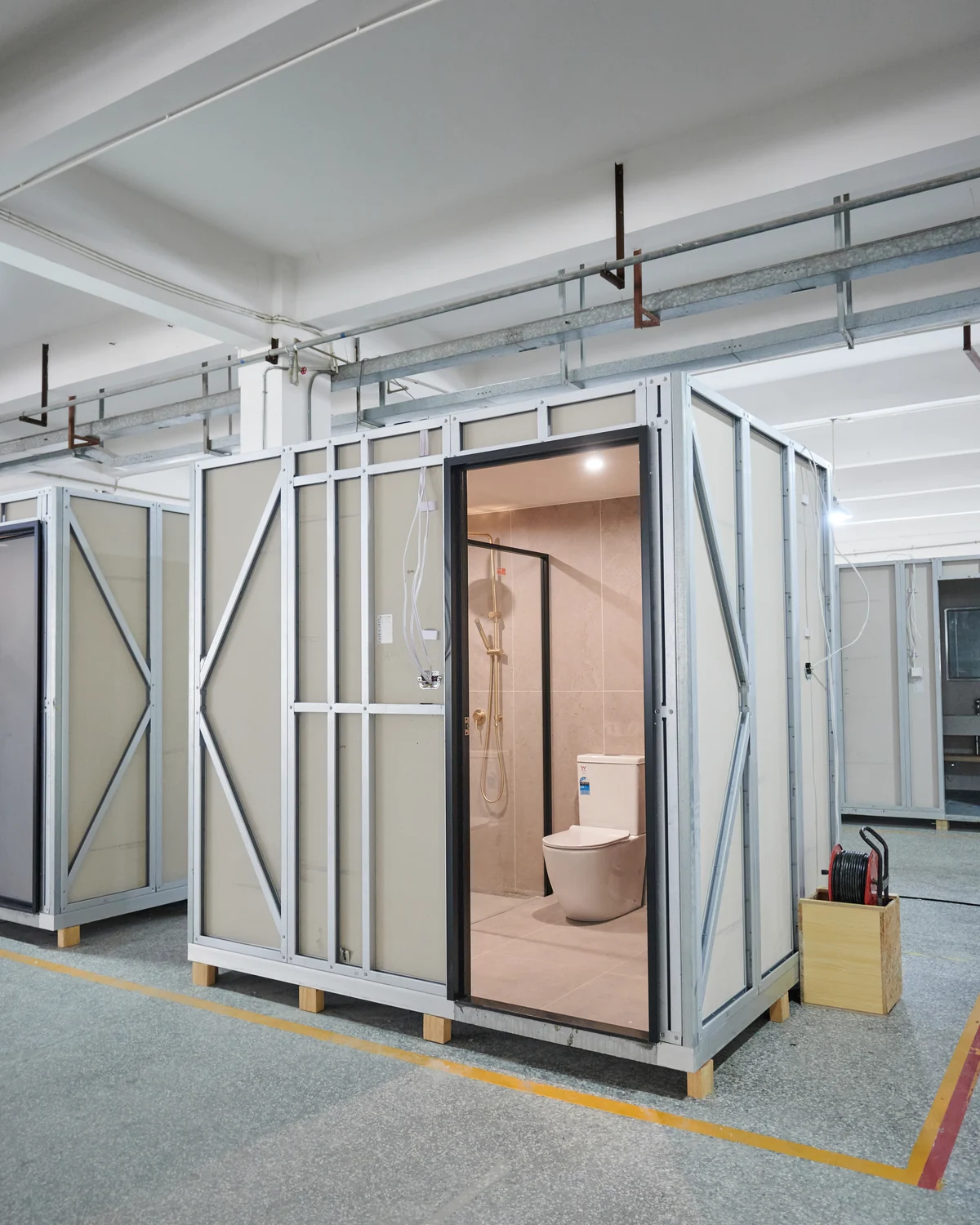 Client-supplied complete bathroom pod sample with visible enclosure and fitted interior